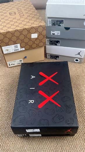 The legendary KAWS x Air Jordan 4 in cool grey