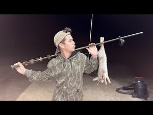 Hunting rabbits with a blow gun