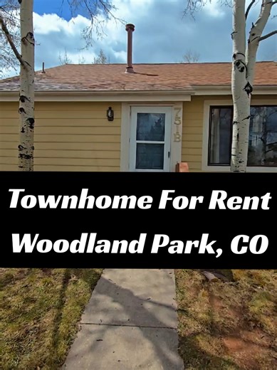 Now for Lease in Woodland Park Welcome to this pleasant tri-level townhome in beautiful Woodland Park, where mountain living meets everyday convenience. This home features a bright and open living space with a large front window, along with walk-out access to a private yard complete with a grassy area and stone patio, perfect for relaxing or entertaining. Upstairs, you’ll find the primary bedroom with an adjoining full bathroom, as well as a spacious loft that can easily function as a home offic