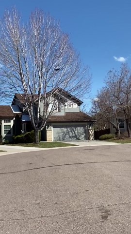 Neighbors Have Fun And Share Wine With Each Other Using a Drone During Quarantine In Colorado, USA