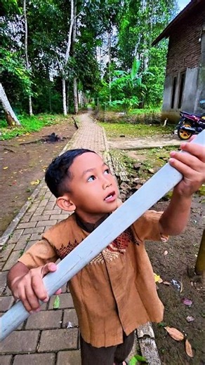 What is Anam carrying a long PVC pipe for? #trendingshorts#shorts#trending#vlog#funny