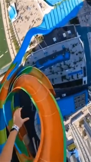 "Epic Water Slide Fail: Too Fast and Flies Off the Edge!"