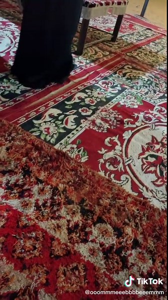 Intricate Floral Design on Vibrant Carpet