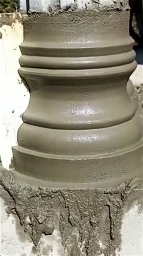 How to form a wet cement column using a metal scraper