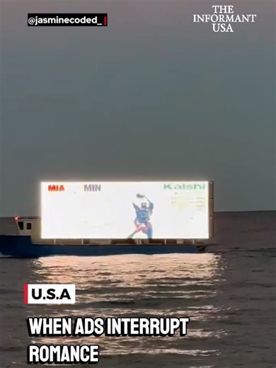 💍🌊 ENGAGEMENT INTERRUPTED BY AD BOAT 🔴 A romantic beach proposal went viral after a boat carrying a Kalshi digital advertisement floated past during the moment. 🗣️ Viewers debate how far advertising should go. #ViralDebate #AdvertisingCulture #BreakingDevelopments #TheInformantUSA