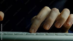 Typing on keyboard. Hands and fingers close-up typing on keyboard. Sliding camera. Using technology working productive.