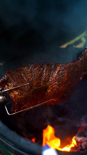 Ribs, reimagined. The new Big Green Egg Rotisserie takes them for a spin for a fall-off the bone tender every time. Full recipe: https://biggreenegg.com/blogs/recipes/rotisserie-st-louis-ribs . . . #BigGreenEgg #RotisserieRibs #BGERotisserie #LiveFireCooking #BGERecipes | Big Green Egg