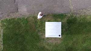 Man enters and exits portable restroom 4k