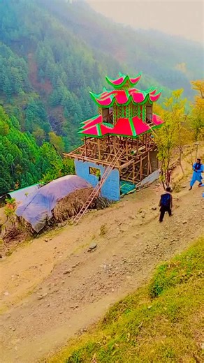 Exploring a Colorful Pagoda in a Scenic Mountain Setting