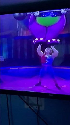Strong Boy Lifting Barney Off His Feet