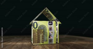 Euro 200 EUR money banknotes paper house on the table. European Union currency notes 3D concept of home mortgage loan, debt, rent, costs, liabilities and building wealth financing.