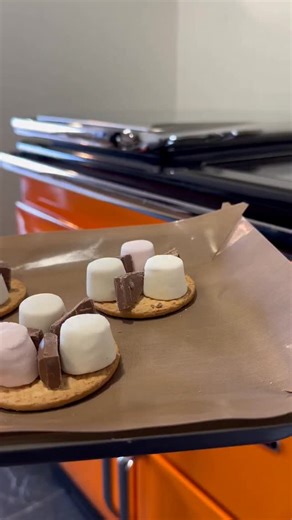 There’s something truly special about Bonfire Night - the crackle of fireworks, the chill in the air and the comforting warmth of something sweet shared by the fire. ✨ S’mores make the perfect treat for the occasion - nostalgic, simple and they’re incredibly simple to prepare using the Rayburn Ranger® grill. 🔥🍫 Here’s how to make them: 1. Preheat the roasting oven to the grill setting. 2. Line a baking tray with Bake-O-Glide™ and arrange digestive biscuits in a single layer, leaving a little s
