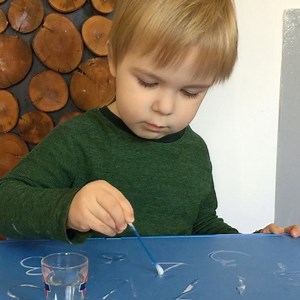 Tracing chalk numbers with wet cotton buds | TheDadLab