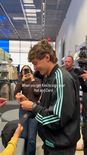 F1 Family | Pina 🏎️ on Instagram: "Lights out… and a memory that will last forever ✍️ Standing next to my son while Kimi Antonelli signs our hat and card at the Adidas meet & greet during the Las Vegas Grand Prix. This is more than F1 — this is a father-son dream under the Vegas lights. 🌃🏎️❤️ #F1Family #KimiAntonelli #LasVegasGrandPrix"
