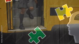 Animation of puzzles falling over human heads with maze and school children getting off the bus