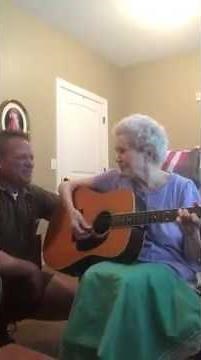 88 year old lady with alzheimers plays guitar and sings with her son
