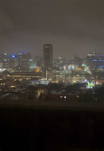 Richmond rainy night skyline: urban rain photography tips