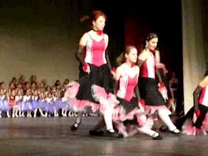 Young girls dancing can can