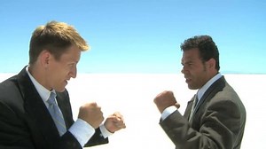 two businessmen fighting