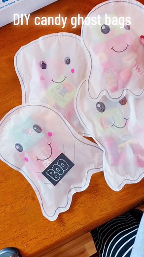 DIY Candy ghost bags! Super easy craft, costly, & your kids will love it. I explain step by step how to make these in this short clip! You only need a few supplies! #diyhalloween #ghostcraft #kidshalloween #halloweencrafts #momlife #elementaryschool #holidaycrafts #easycraft #parchmentpaper