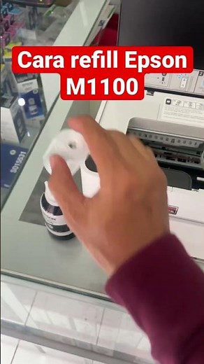 How to refill epson M1100