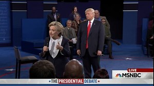 Donald Trump wandered behind Hillary Clinton at the second presidential debate. | HuffPost UK Politics