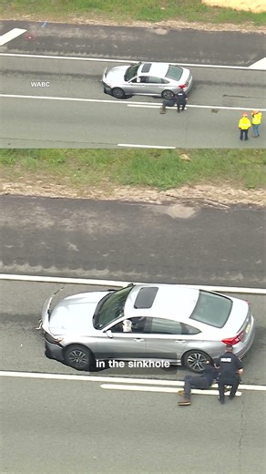 Sinkhole traps car on major New York state highway