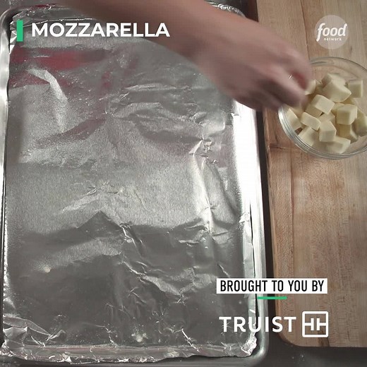 Christmas Tree Pull Apart Bread is fun to eat AND make 🎄 Sponsored by Truist Bank. Get the recipe: https://foodtv.com/2JvM9lt and light up your holiday: https://foodtv.com/Truist! | Food Network