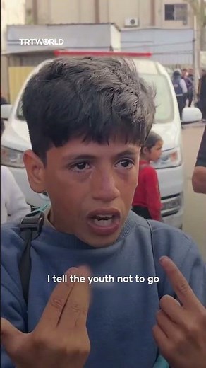 Palestinian child mourns mother killed by Israel at aid point