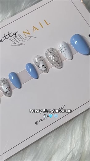 That Pretty Nail on Instagram: "Merry Christmas!! 🎄❄️ Welcome to Part 18 of 20 Nail Designs ’til Christmas and this one’s a little different because we’re packing up a custom set. Soft baby blue, snowflakes, and tiny winter details… it’s giving cozy snow day vibes, and I’m obsessed. Would you wear this? #xmasnails #bluenails #festivenails #christmasnailinspo #winternails"