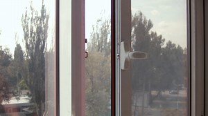 Man Closes Opens Energy-saving Window Stock Footage SBV-304646156 - Storyblocks