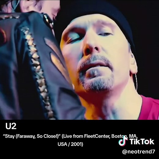 🎵 U2 – “Stay (Faraway, So Close!)” (Live from FleetCenter, Boston, MA, USA / 2001) “Stay (Faraway, So Close!)” is one of U2’s most emotional and intimate songs. It was released in 1993 as part of the album Zooropa and was written by Bono, The Edge, Adam Clayton, and Larry Mullen Jr. The song was originally created for Wim Wenders’ film Faraway, So Close! and later became a fan favorite because of its deep lyrics and stripped-down sound. Lyrically, the song talks about longing, emotional distanc