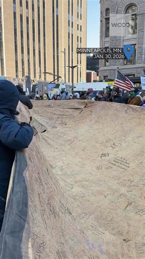 As was the case last Friday afternoon, thousands of protesters marched through downtown Minneapolis in opposition to the ongoing surge in federal immigration enforcement forces in the Twin Cities and greater Minnesota. The demonstration targeted Government Plaza, between the Minneapolis City Hall building and the Hennepin County Government Center, as well as Washington Avenue and nearby park The Commons, by U.S. Bank Stadium. One group of protesters carried a large-scale replication of the Pream