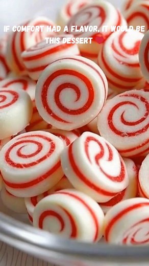 Homemade Peppermint Swirl Candies | Melt-in-Your-Mouth Christmas Treats 🍬❤️ Aren’t these just the prettiest little swirls? I’ve been making these since my kids were little — creamy, minty, and so festive. Perfect for gift jars or sneaking from the candy dish 😄 Ingredients: 2 cups powdered sugar 2 tbsp unsalted butter, softened 2 tbsp heavy cream ½ tsp peppermint extract Red gel food coloring Instructions: In a bowl, beat together powdered sugar, butter, cream, and peppermint extract until a so