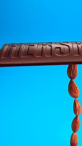 HERSHEY'S Milk Chocolate with Whole Almonds - a tasty balancing act | HERSHEY'S