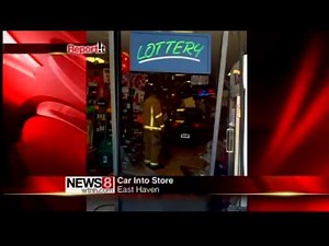 Car drives through liquor store