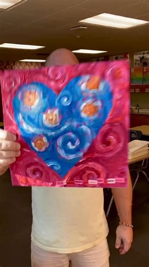 Second grade meets Van Gogh and it’s pure magic. These starry hearts combine our study of Vincent van Gogh with a Valentine’s Day–inspired composition that’s all about movement and choice. Students use the dip and flip method to load two colors on one brush, tipping and flipping as they paint inside the heart to create a Starry Night–style sky. Outside the heart, short dash lines in a contrasting color bring even more energy to the background. Students can choose to add paper cut events and a Va