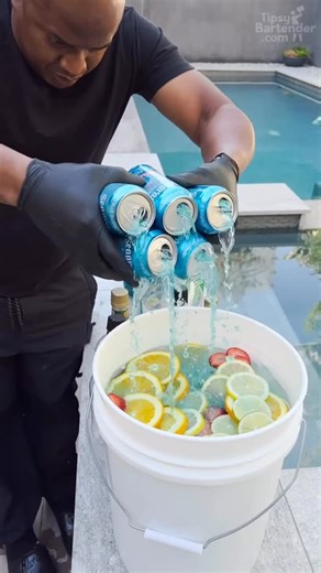 TIPSY BARTENDER 🍻🍹 on Instagram: "Blue Typhoon Bucket Jungle Juice #cocktail"