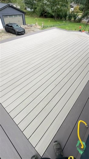 Jason Russell on Instagram: "EOD 9/11: Top deck is laid and we started installing our @timbertech #azek stair treads and landing boards. She’s shaping up! #drdecks #yourprescriptionforquality"