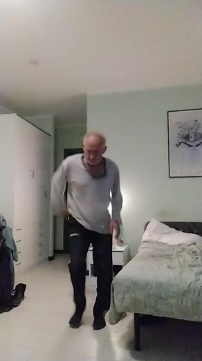 Dance Moves in a Cozy Bedroom Setting