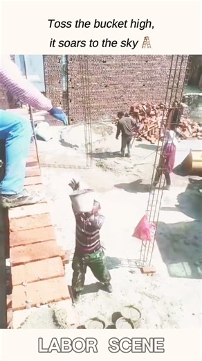 Mortar bucket toss on site, precise catch makes work bright 🪣