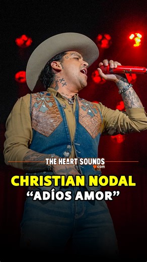 The Heart Sounds | Music Magazine on Instagram: "CHRISTIAN NODAL — “Adiós Amor” live in San Antonio 💔✨ There was a moment last night when time just… stopped. No dancers, no pyro, no massive production — just Nodal, an acoustic guitar, and thousands of voices echoing every word of “Adiós Amor.” It felt raw, intimate, and almost spiritual. The Frost Bank Center turned into one giant choir, and you could feel the sound vibrating through the floor, the seats, the air — straight to the chest. Those 