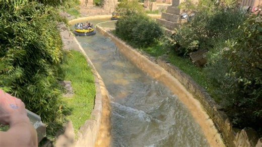 Mischievous folks splash people aboard water ride with cannons and glasses