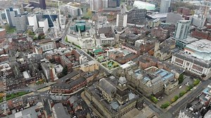 Leeds UK, 11th Nov 2018: Decending aerial footage of the leeds city centre and leeds town hall showing construction work being done on the Leeds University in West Yorkshire in the UK