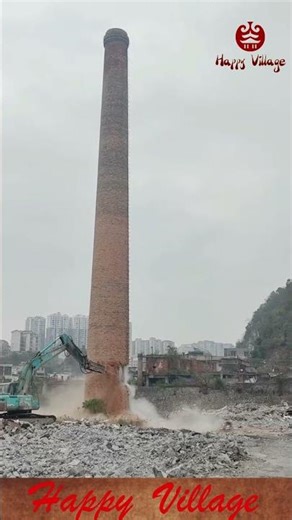 Controlled demolition brings a tall,chimney down with precision.#Demolition #IndustrialHeritage