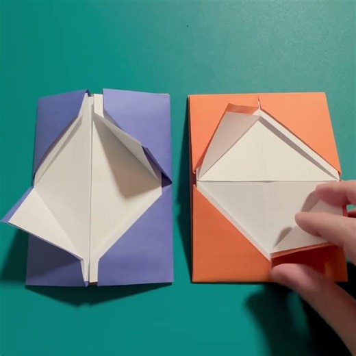 #paperfolding attracting opposites, then inserting sq. photos/names/artworks of complementary duo