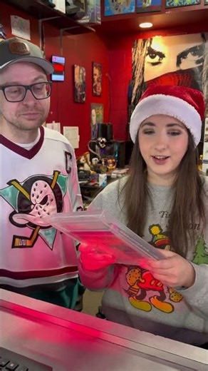Jason opens a Christmas gift