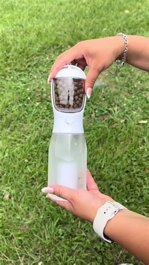 Treats, water, and a bowl in ONE bottle the ultimate on-the-go pet tool.