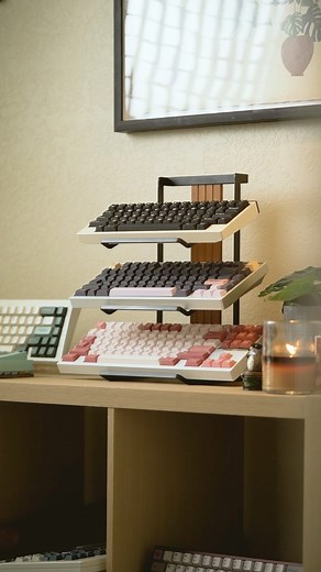 Tristan Green on Instagram: "Redecorate ✨ This is the @osumekeys Three Tier Keyboard Sheld. This is single handily the highest quality stand I’ve ever seen. It’s available in white/black. I definitely want to pick up the white one next because it will match perfectly to my setup! These are estimated to release in November so follow @osumekeys for more updates! Let me know what you think of the setup so far! #customkeyboards #customkeyboard #keeb #keebs #mechanicalkeyboard #mechkeys #desksetup #e