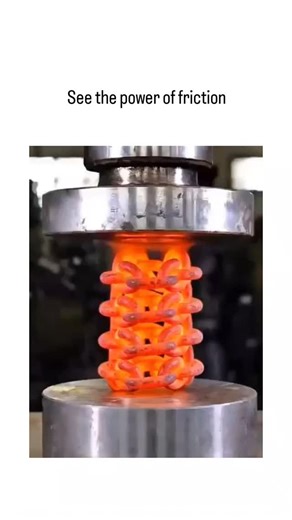 queen 👑 on Instagram: "The post shares an AI-generated 11-second video of a hydraulic press slowly compressing a glowing orange-hot metal coil on a metal base, visibly generating sparks and intensified heat to demonstrate friction's mechanical effects in deformation. This visualization aligns with tribology research, such as a 2018 study in the Journal of Materials Processing Technology, showing friction in hot metal forming can raise temperatures by 200-500°C through energy dissipation, aiding